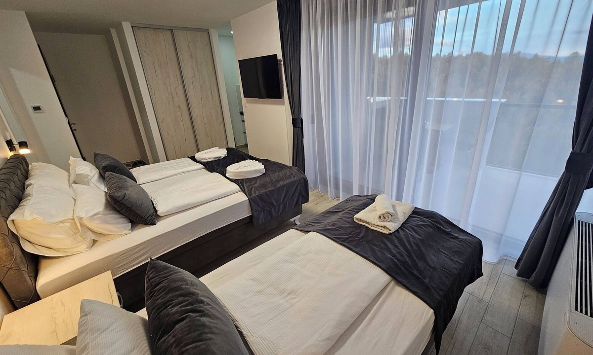 Novi Grad Sarajevo Condo | 1BDR apartment, shared pool, kitchen, balcony, C22
