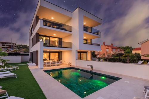 Krk Villa | Deluxe villa with heated pool, whirpool, sea view near beautiful beach III - by Traveler tourist agency Krk ID 2402