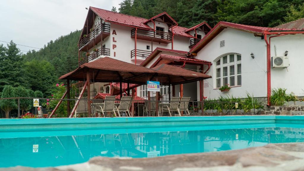 Rasinari House | Pensiunea Alpin