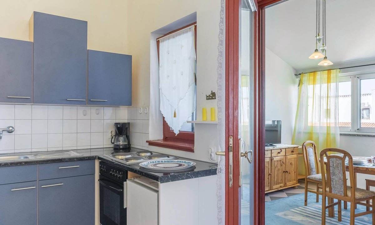 Barbariga Apartment | This practically furnished apartment is located in Barbariga.