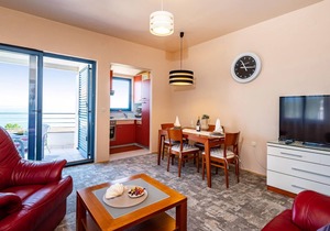 Attractive apartment with shared pool and sea view for a great vacation.