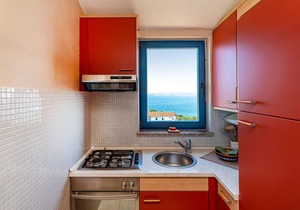 Attractive apartment with shared pool and sea view for a great vacation.