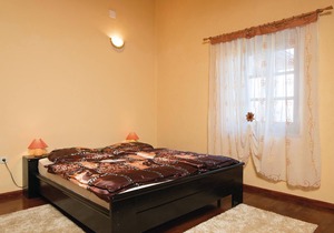Experience a pleasant stay in this rustic apartment, located in a residential house in the village o