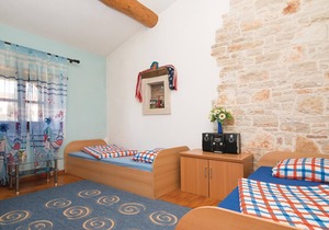 Experience a pleasant stay in this rustic apartment, located in a residential house in the village o