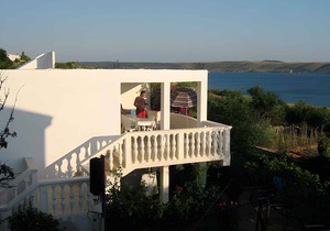 Holiday apartment First row to the sea