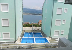 Holiday apartment with pool and sea view
