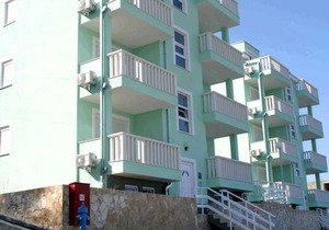 Holiday apartment with pool and sea view