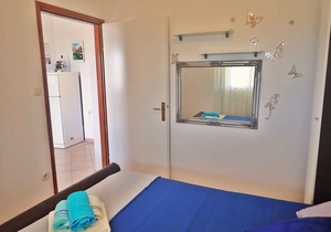 Holiday apartment with air conditioning and terrace with sea view
