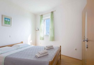 Holiday apartment with balcony and sea view
