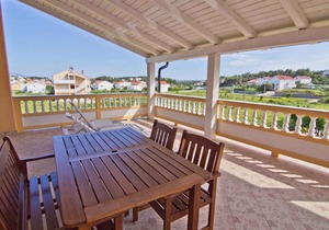 Holiday apartment with balcony and air conditioning