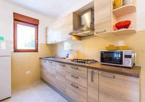 Holiday apartment with air conditioning and barbecue