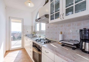 Holiday apartment with garden for common use