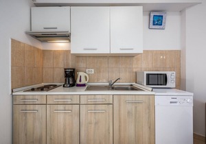 Holiday flat with sauna, sea view, whirlpool and heated pool