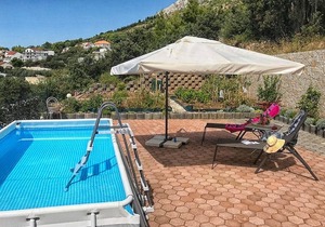 Studio flat with a swimming pool Stanići, Omiš (AS-18676-a)