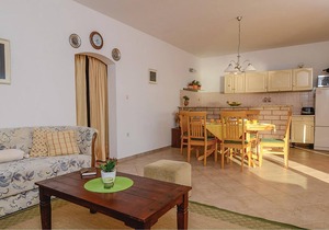 The pretty cottage is located above the village Podobu.