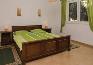 The pretty cottage is located above the village Podobu.