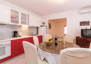 These comfortable and practically furnished apartments are located just 20 meters from the beach.