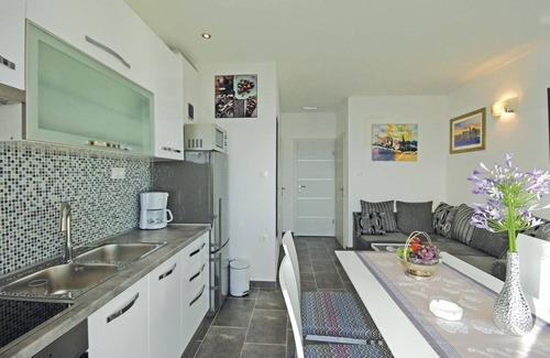 Drasnice Apartment | Excellent location directly on the sea and on a pebble beach makes this beautifully furnished apartm