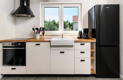 Zaostrog Villa | Modern villa, heated pool, 3 bedrooms+3 bathrooms, playground, quiet location,