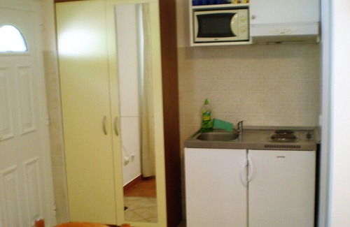 Stikovica Apartment | Villa Doris - STUDIO apartment for 2+1 adults, private terrace, ground floor