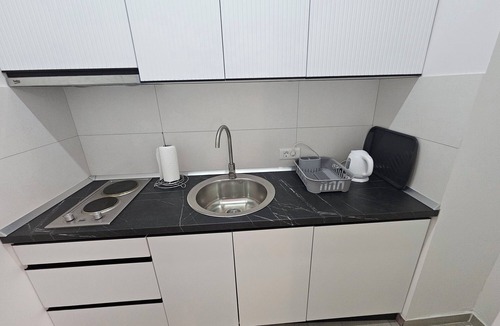 Novi Grad Sarajevo Condo | 1BDR apartment, shared pool, kitchen, balcony, C22