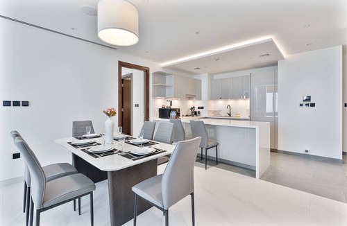 Nad Al Sheba Apartment | 3BR Apartment Partial Burj & Dubai Frame Panorama