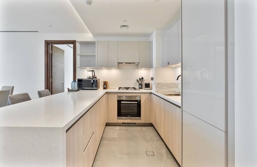 Nad Al Sheba Apartment | 3BR Apartment Partial Burj & Dubai Frame Panorama