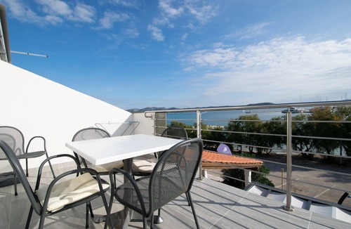 Municipality of Murter Apartment | Apartment with 2 bedrooms, terrace with sea view, right on the beach