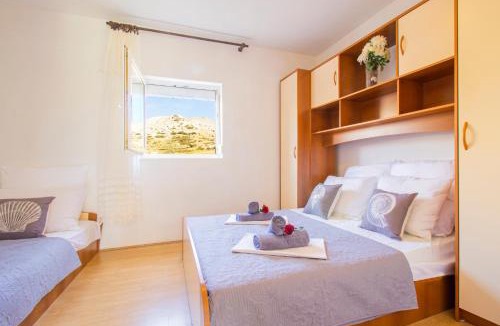 Metajna Apartment | Asta view over sea reed landscape and bay