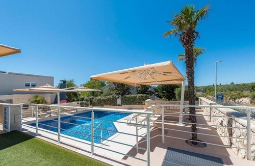 Novalja Apartment | Azure retreat by the garden lane