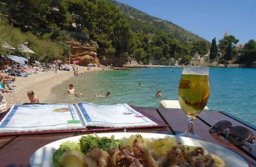 Cove Basina (Jelsa) House | Bol. Seafront house, near beach with private parking space.