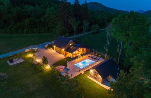 Gospic House | Eco-friendly mountain retreat with pool, jacuzzi, sauna, and panoramic Velebit views.
