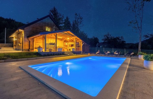 Gospic House | Eco-friendly mountain retreat with pool, jacuzzi, sauna, and panoramic Velebit views.