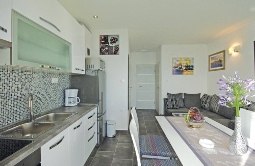 Drasnice Apartment | Excellent location directly on the sea and on a pebble beach makes this beautifully furnished apartm