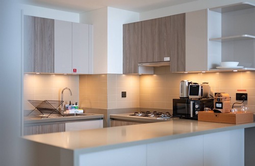 Nad Al Sheba Apartment | High-Floor 1BR with Asst Room, Featuring a Glimpse of Burj Khalifa and Creek
