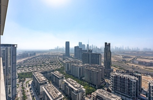 Nad Al Sheba Apartment | High-Floor 1BR with Asst Room, Featuring a Glimpse of Burj Khalifa and Creek