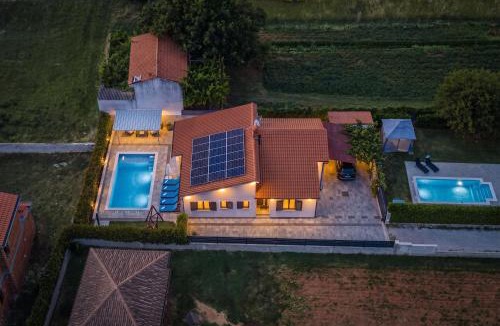 Marcana Villa | Holiday House Gortan for 7 people near Pula with children playground and heated pool