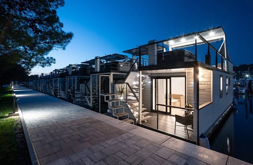 Seca Boat Rental | Houseboat with terrace by the sea