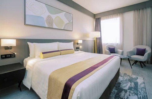Al Muraqqabat Hotel | Iconic Dubai Views | Steps to Burj Khalifa, Dubai Fountain & Downtown Adventure