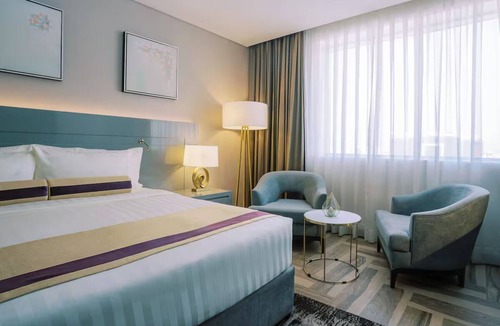 Al Muraqqabat Hotel | Iconic Dubai Views | Steps to Burj Khalifa, Dubai Fountain & Downtown Adventure