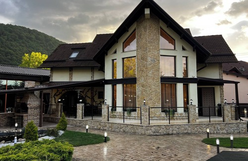 Bran Ski Chalet | Luxurious Villa Near Dracula's Castle with Indoor Pool, Theater, and More