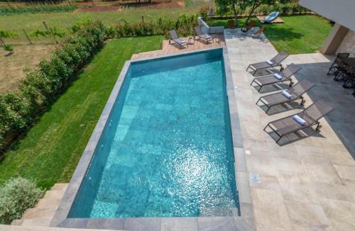 Banjole Villa | Luxury beachside villa with a pool and a sea view