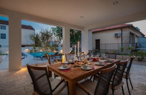 Biograd na Moru Villa | Luxury Home with Heated Pool, Sauna & Cinema I 150 m from Beach