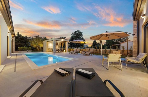 Loborika Villa | Modern Istrian Villa Teva near Pula in Istrian style by Istrabook