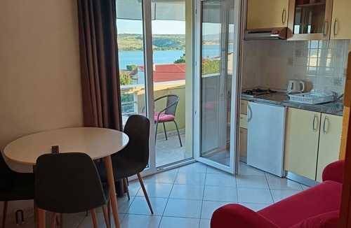 Municipality of Posedarje Apartment | One bedroom apartment with balcony and sea view Posedarje, Novigrad (A-6190-b)