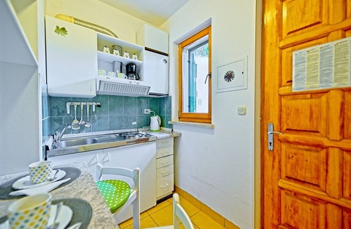 Postira Apartment | One bedroom apartment with terrace and sea view Postira, Brač (A-2913-a)