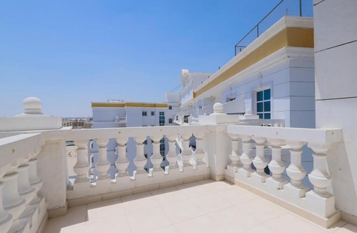 Dubai Production City Apartment | OYO Home 252 1BHK Qasr Sabah 3 IMPZ