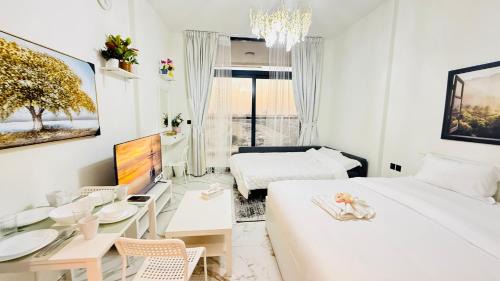 International City Apartment | Petalz Luxury furnished studio with Balcony Swimming Pool Gym Kids play ground