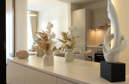 Nad Al Sheba Apartment | Premium 1BR Oasis - City Views & Pool