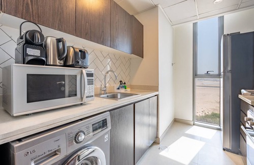Dubai Production City Apartment | Relaxing 2BR Stay with Furnished Balcony, Only 20 Minutes from JBR Beach